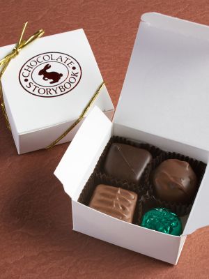 white box filled with 4 assorted boxes