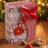 Holiday red and white box with scattered chocolates