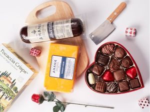 meat, cheese and chocolate on a charcuterie board
