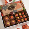 Falling Leaves chocolate box filled with chocolates decorated in leaves