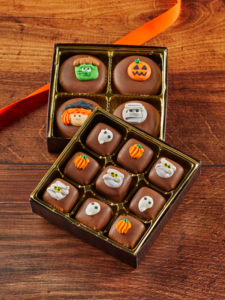 halloween delights gift box which shows one 9pc caramels box and one 4pc chocolate cookies box