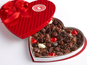 Red Heart Shaped Box filled with assorted chocolates