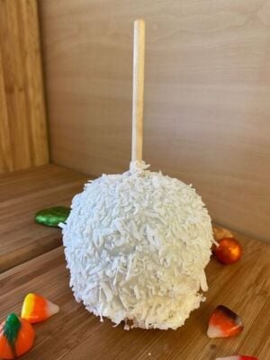White Chocolate Caramel Apple coated in Coconut