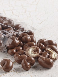 clear bag of milk chocolate covered cashews