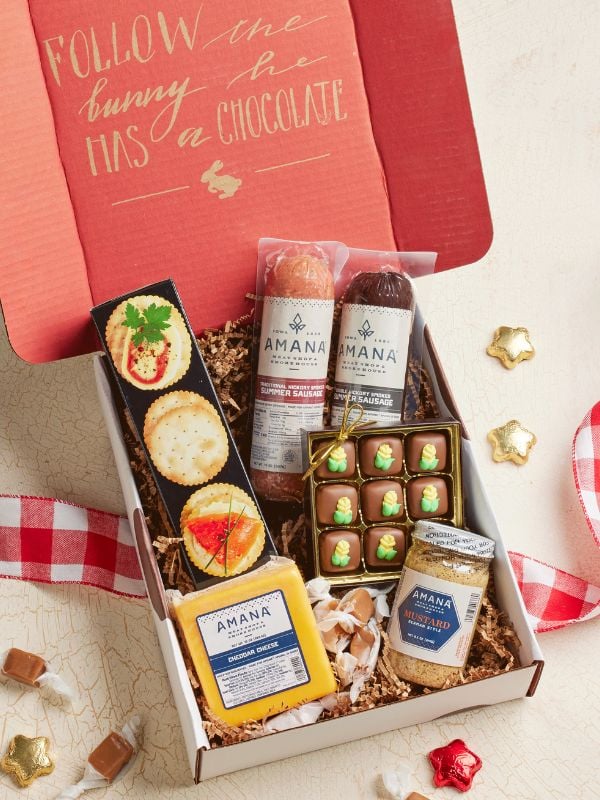 1 opened Taste of Iowa Gift Box featuring sausage, cheese, chocolates and crackers.